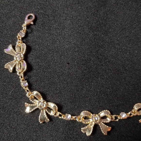 Gold And Rhinestone Bow Bracelet - Picture 8 of 9